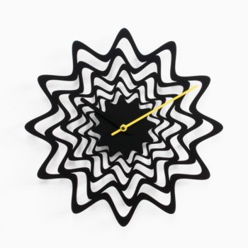 Orologio da parete moderno in metallo colorato Flux