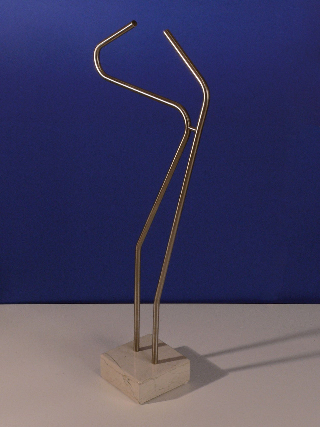 Indossatore da camera in acciaio inossidabile e marmo Jordon