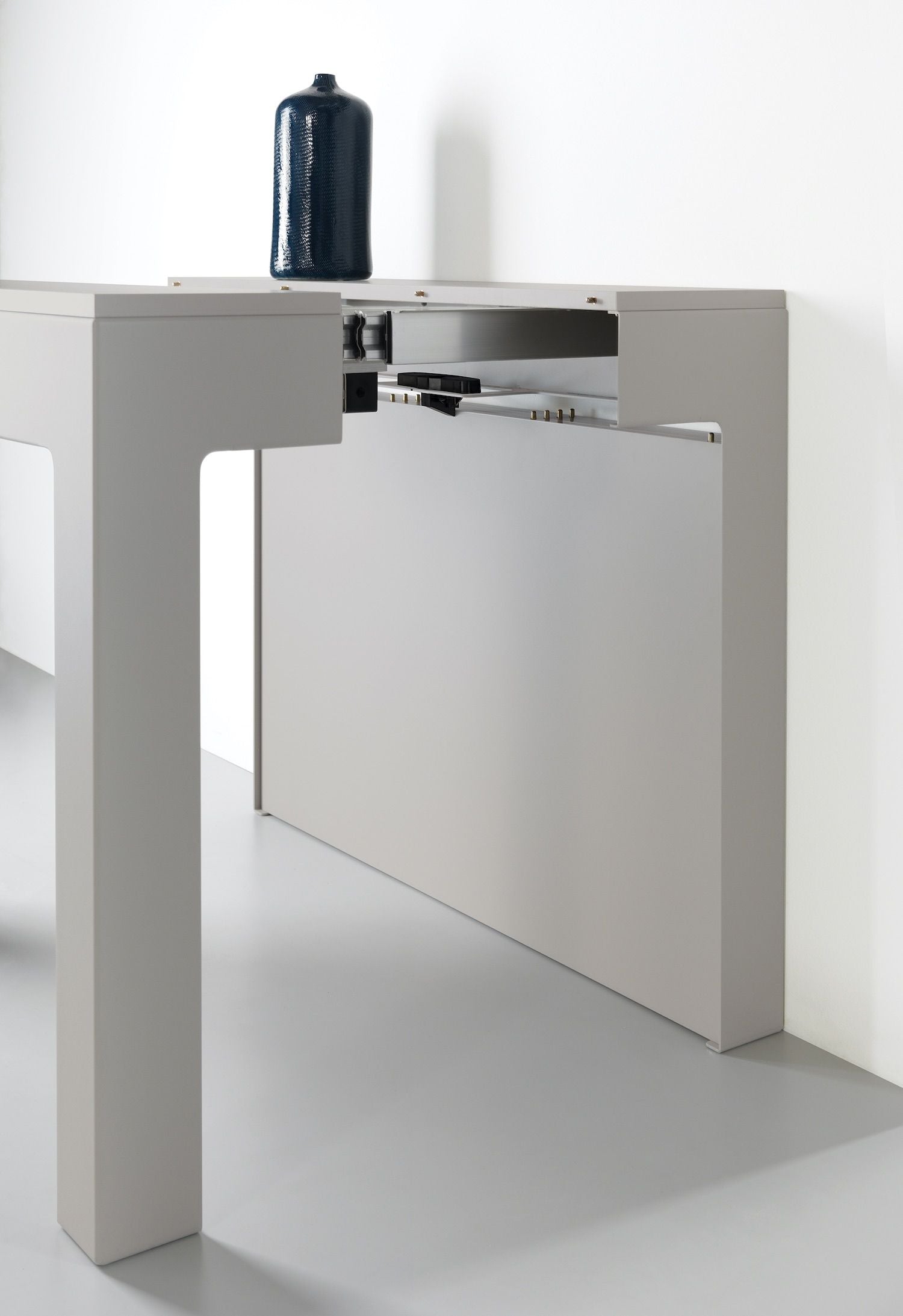 Tavolo consolle allungabile in acciaio e laminato Dutton