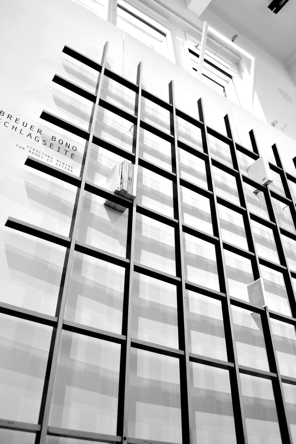 Libreria da parete in legno design moderno Schlagseite