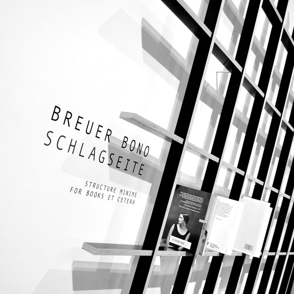 Libreria da parete in legno design moderno Schlagseite